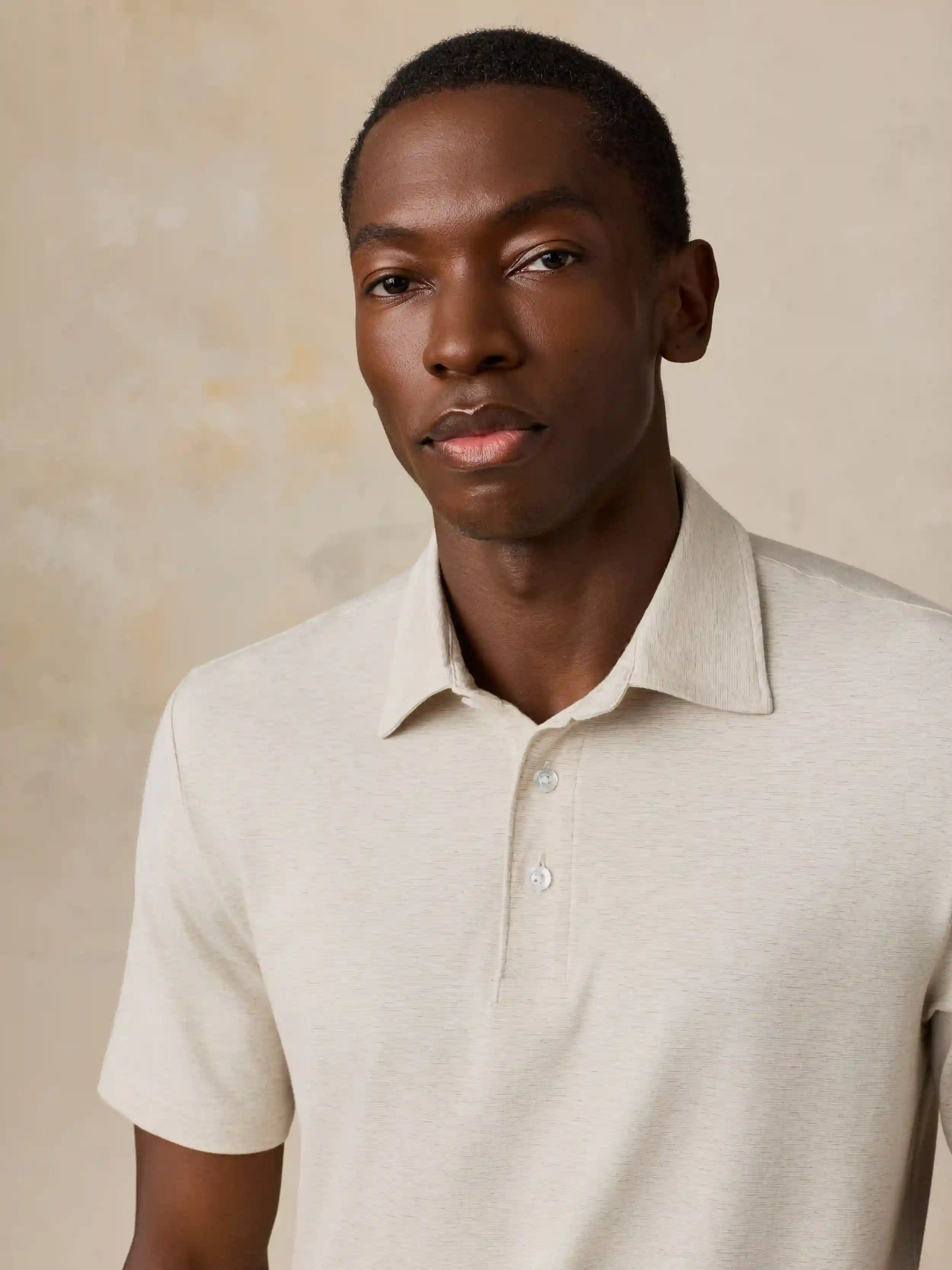 Short-Sleeve Movement™ Polo - Shore Sand Feeder